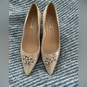 LK Bennet. Very lightly worn. Light gold shimmer low heels.